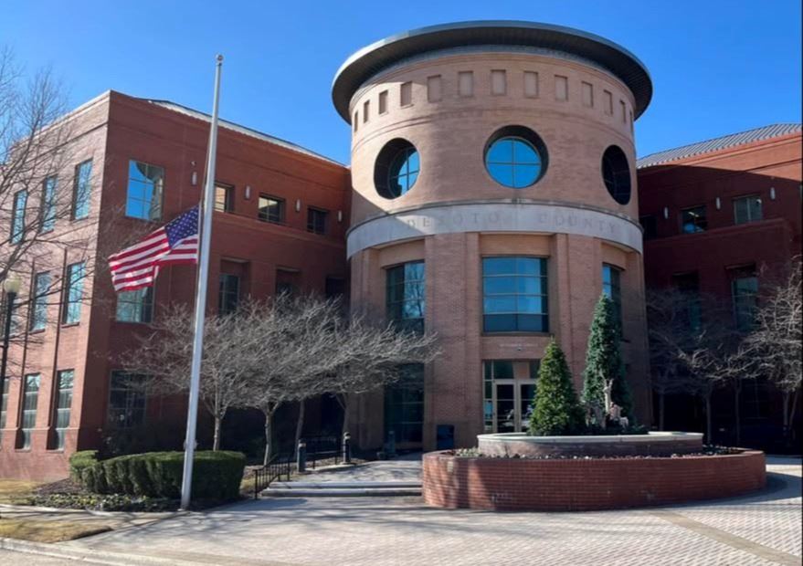 desoto county admin building half staff flag